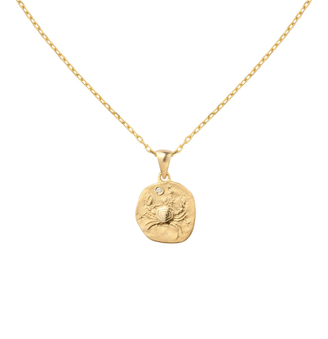 Złoty naszyjnik z medalionem ze znakiem zodiaku Rak